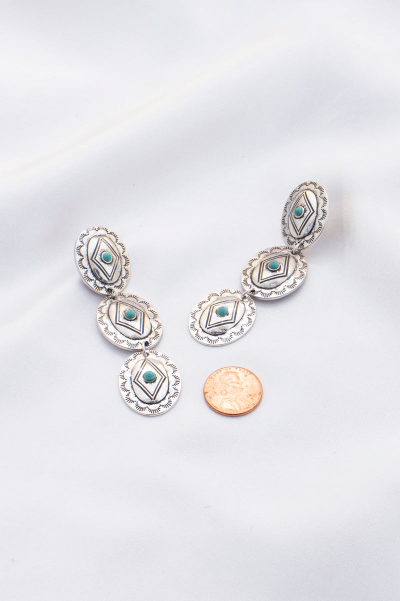 Boucle d'oreille ovale en métal occidental