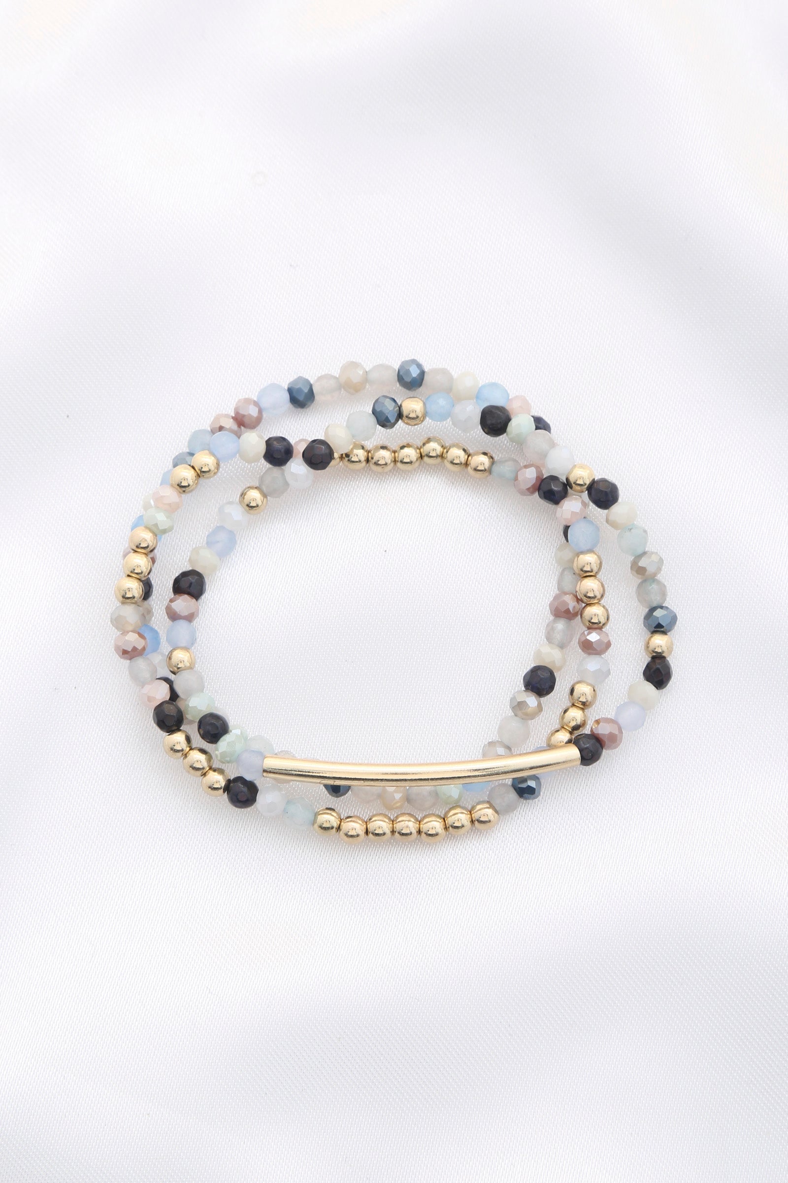 Bracelet extensible en perles de verre à 3 rangées
