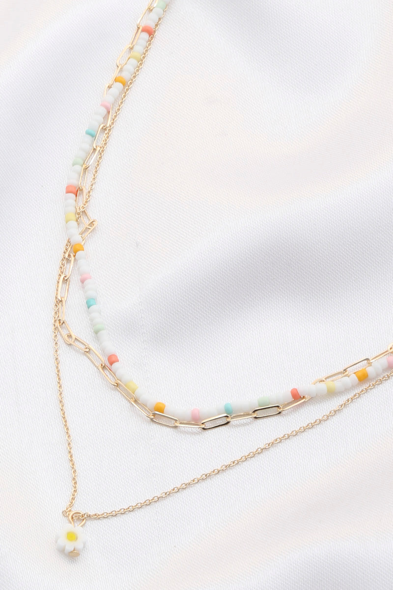 Collier superposé de perles à breloque fleur délicate