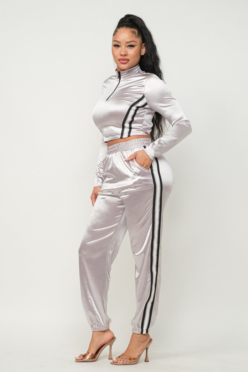 Ensemble veste et pantalon à rayures zippées sur le devant