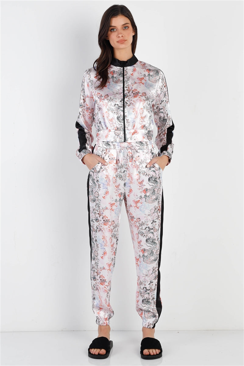 Ensemble veste et pantalon zippés à imprimé multicolore effet satiné contrasté noir