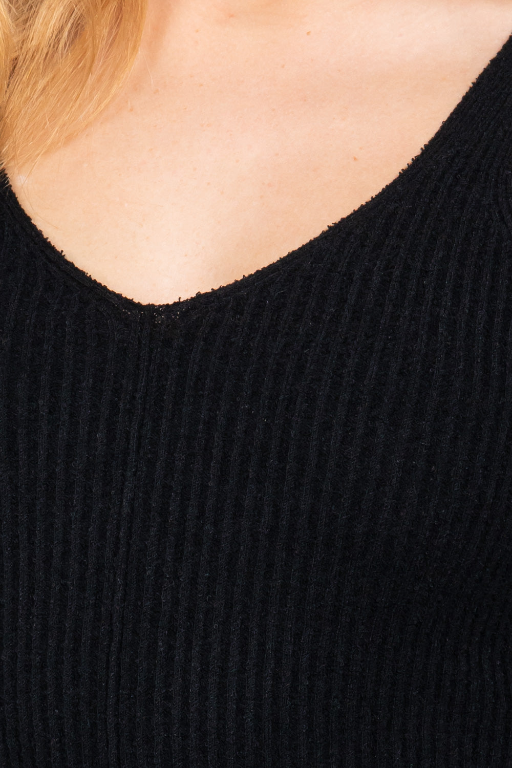 Haut pull sans manches à col en V