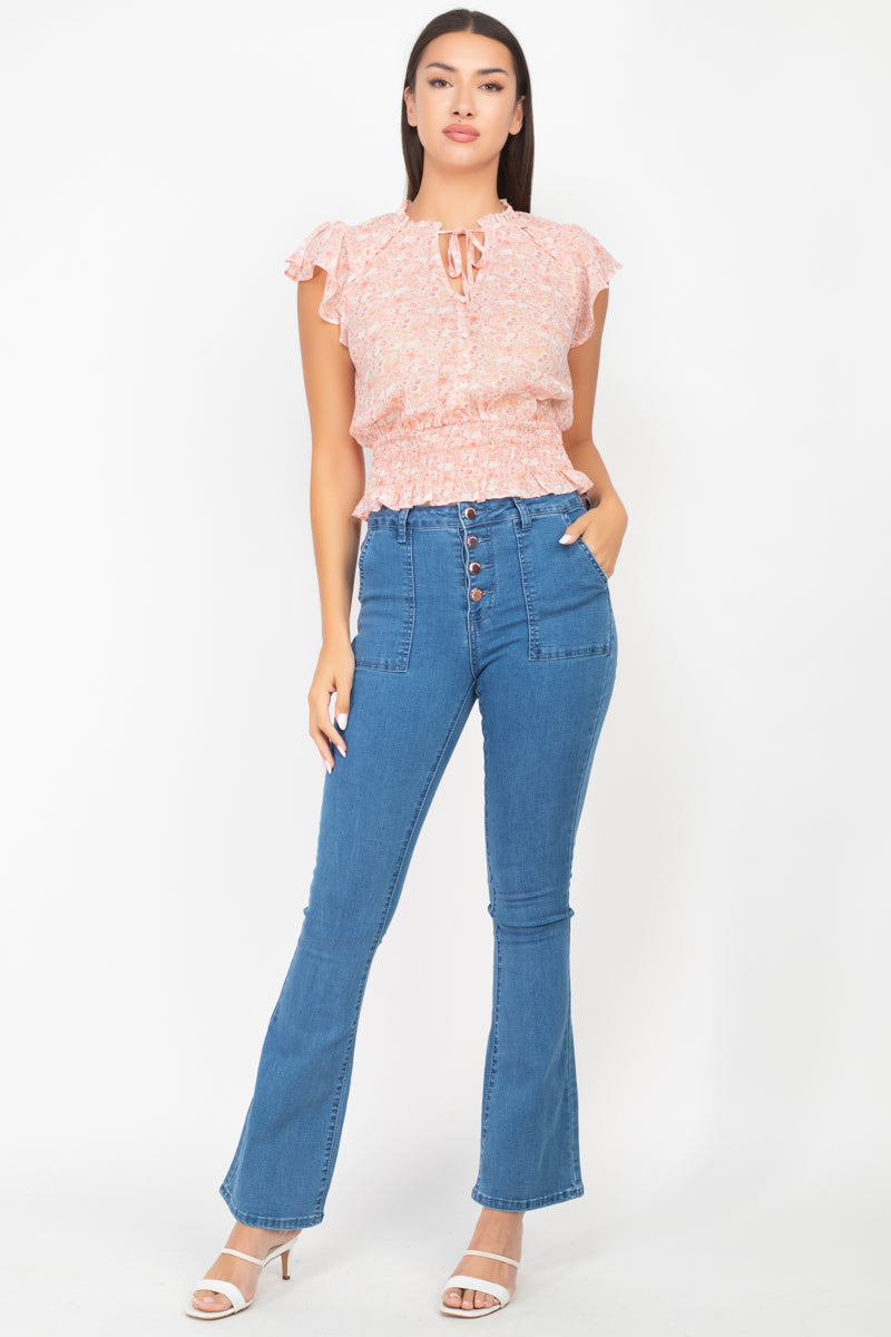 Haut smocké fleuri à manches flottantes