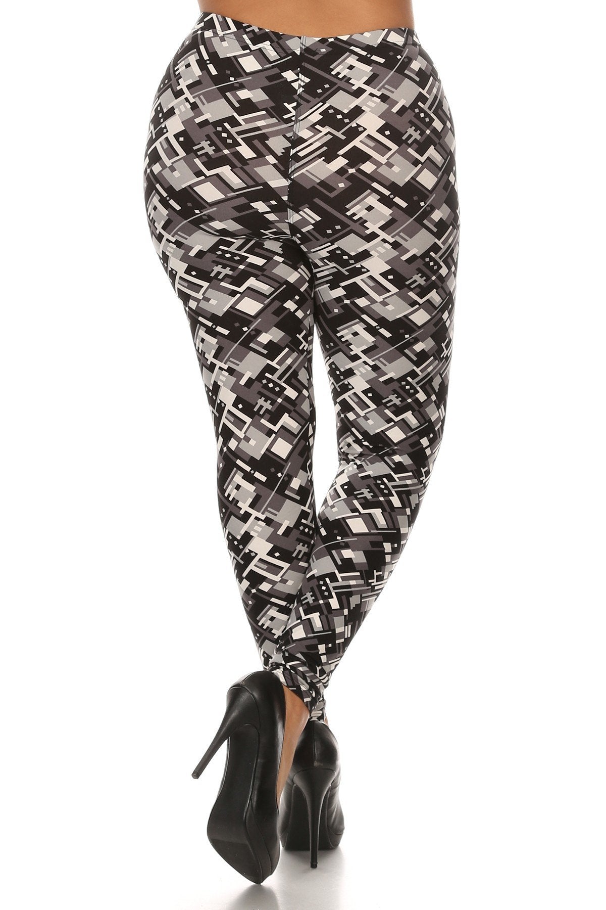 Legging en tricot imprimé à motif géométrique abstrait de grande taille avec taille élastique et coupe taille haute.