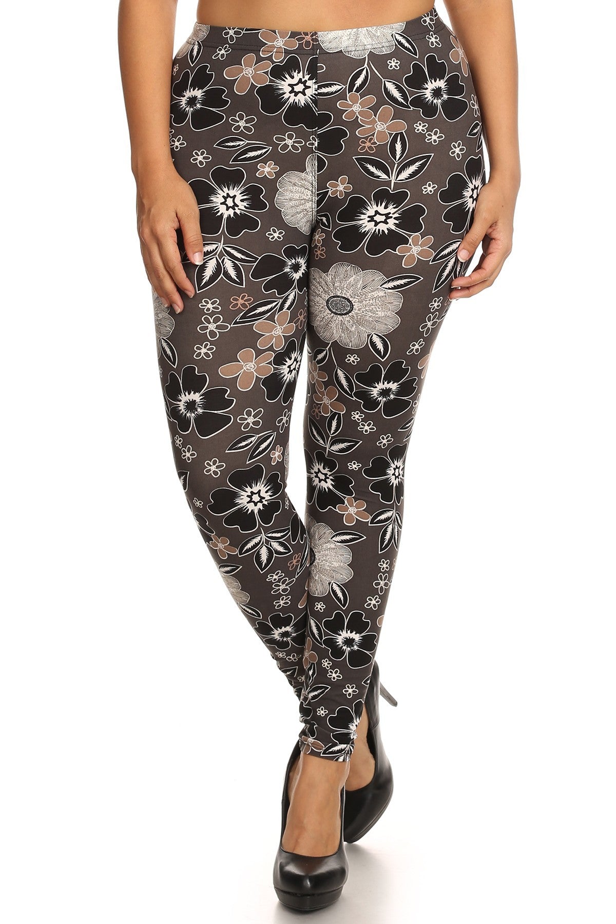 Legging en tricot imprimé graphique floral de grande taille avec détail de taille élastique. Coupe taille haute