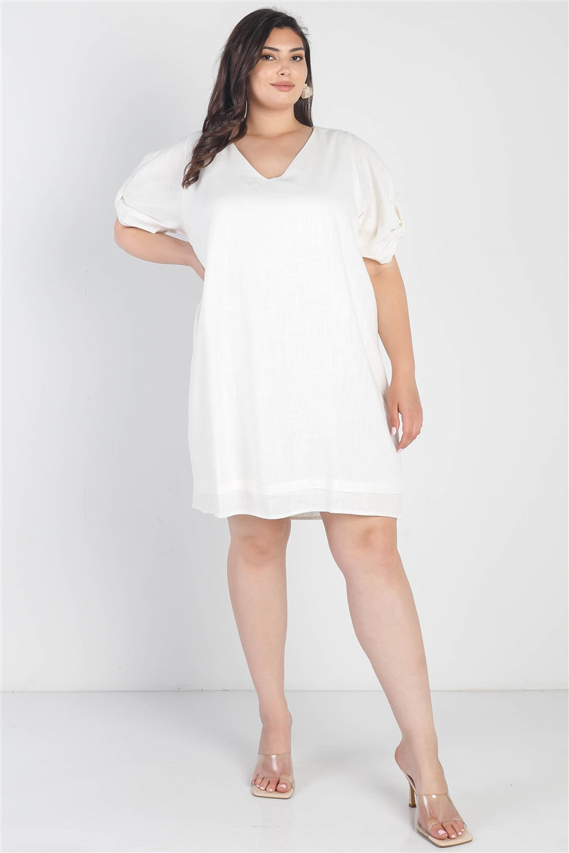 Mini-robe blanche à manches courtes et col en V avec nœud et détail