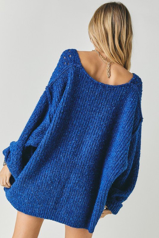 Pull ample uni à col en V