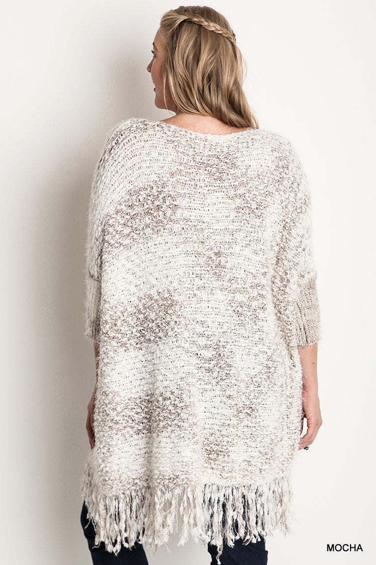 Pull en grosse maille avec bordure effilochée