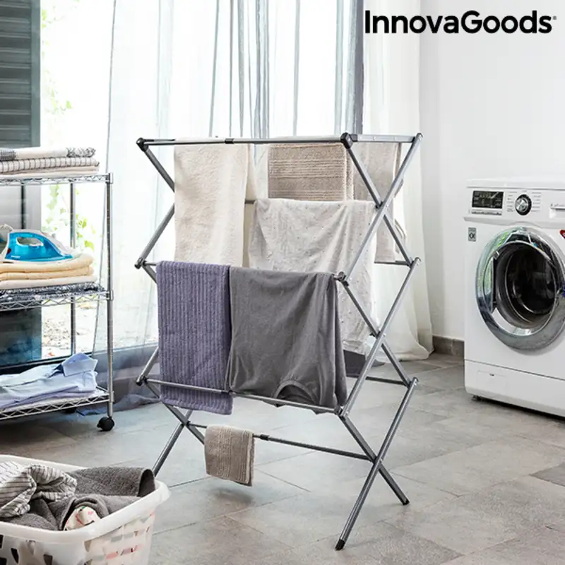 Sechoir a linge metallique pliable et extensible avec 3 hauteurs cloxy innovagoods fer reconditionne a _6246. DIAYTAR SENEGAL - L'Univers du Choix et de l'Authenticité. Explorez notre catalogue et découvrez des articles qui incarnent le patrimoine du Sénégal et la modernité du monde.