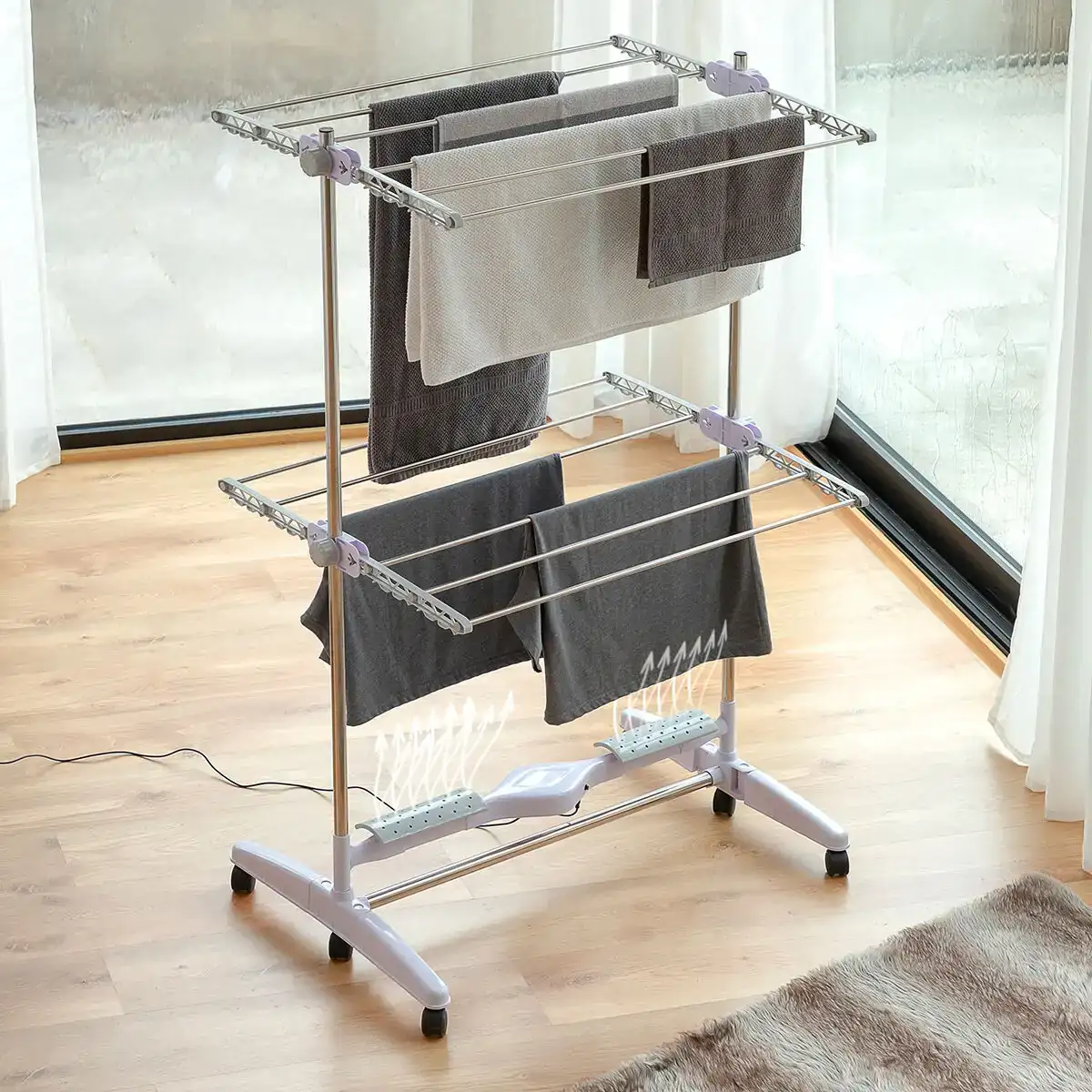Sechoir electrique pliable avec flux d air breazy innovagoods 12 barres 24w_3878. DIAYTAR SENEGAL - Où Chaque Achat Raconte une Histoire. Parcourez notre boutique en ligne pour trouver des articles qui évoquent le savoir-faire et la tradition du Sénégal.