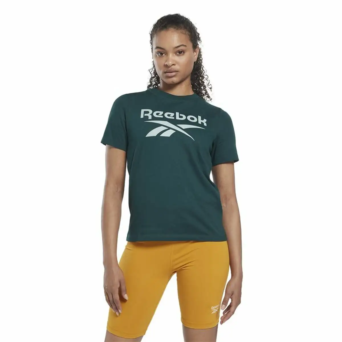 T shirt a manches courtes femme reebok identity cyan_2023. DIAYTAR SENEGAL - Où Chaque Achat Raconte une Histoire. Parcourez notre boutique en ligne pour trouver des articles qui évoquent le savoir-faire et la tradition du Sénégal.