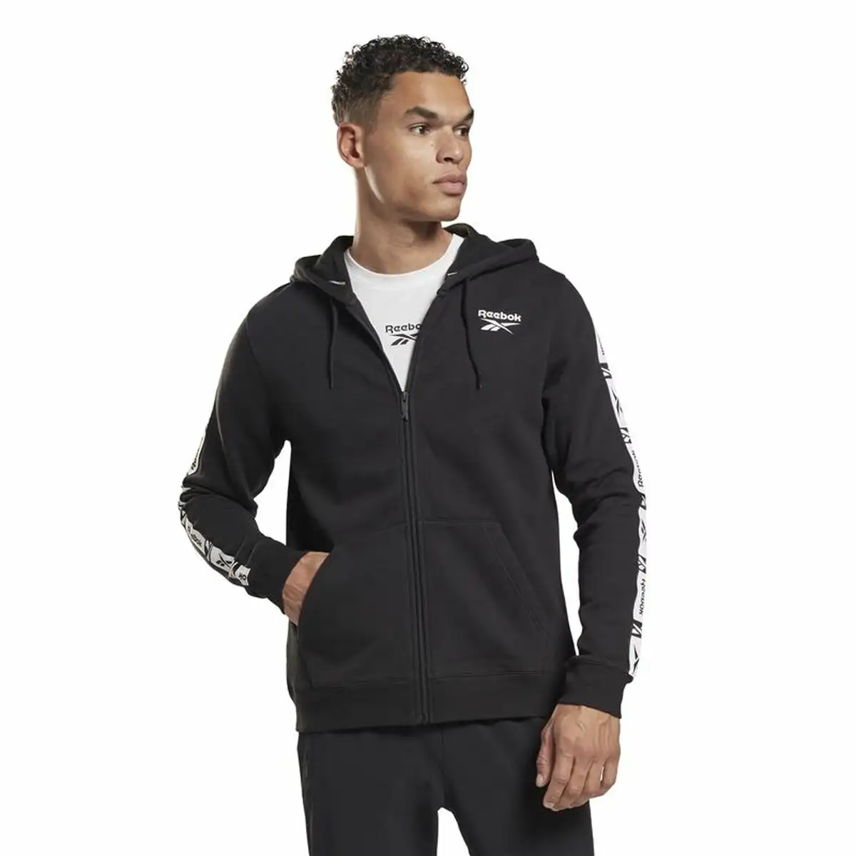 Veste de sport pour homme reebok identity tape fz noir_9167. DIAYTAR SENEGAL - Où Chaque Détail Fait la Différence. Parcourez notre sélection soignée et choisissez des articles qui rehaussent votre quotidien, du fonctionnel à l'esthétique.