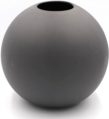 Vase rond mat (noir). DIAYTAR SENEGAL  est votre destination en ligne pour des offres incroyables. Parcourez notre collection variée de produits discount, comprenant des articles pour la maison, l'électroménager, l'informatique, la mode et les gadgets, et découvrez des prix imbattables qui correspondent à toutes les bourses.