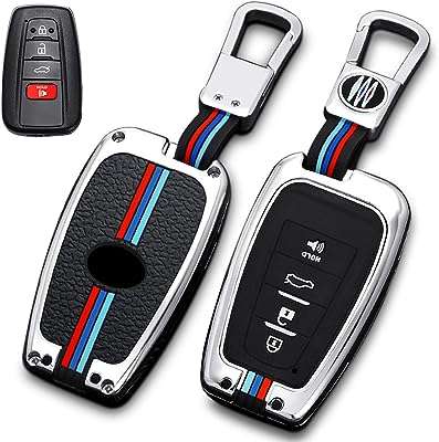 Lesoy coque de clé en silicone souple en métal de qualité supérieure avec porte clés. DIAYTAR SENEGAL - des réductions incroyables sur tous les produits dont vous avez besoin. Parcourez notre boutique en ligne pour découvrir des offres discount sur des centaines d'articles, allant de la mode aux appareils électroménagers dernier cri.