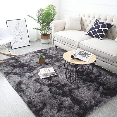 A ommert tapis gris en peluche doux teint par nœuds pour salon. DIAYTAR SENEGAL  - la solution pour des achats discount en ligne simples et rapides. Trouvez tout ce dont vous avez besoin sans vous ruiner, de la maison à l'électroménager en passant par l'informatique et la mode. Profitez de nos prix compétitifs et faites des économies dès maintenant.