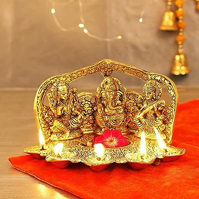 Rubans de marée ganesh saraswati idole de lakshmi statue du dieu hindou. Faites des économies intelligentes avec DIAYTAR SENEGAL  ! Découvrez notre assortiment discount de produits pour la maison, l'électroménager, l'informatique, la mode et les gadgets. Profitez de prix réduits sans compromis sur la qualité, et offrez-vous tout ce dont vous avez besoin à petit prix.