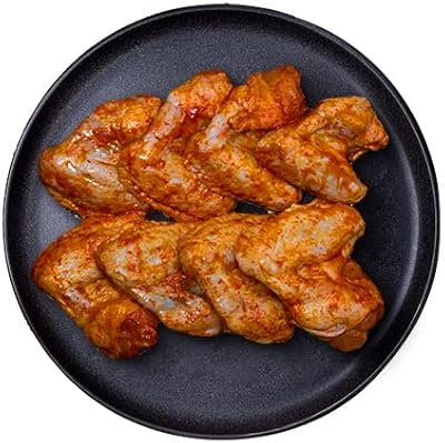 Ailes de poulet marinées, 500 grammes. Diaytar : Des prix mini pour un service maxi