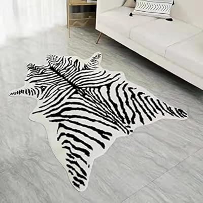 Grand tapis en fausse peau de vache à imprimé zèbre avec un motif