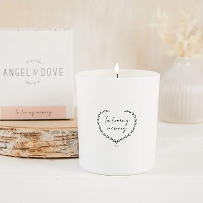 Et colombe 'in loving memory' bougie commémorative tondeuse dans une boîte. Optimisez votre budget avec Diaytar Sénégal