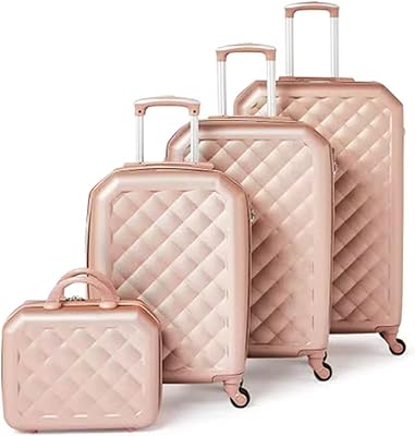 Un ensemble de sacs de voyage à roulettes rigides avec roulettes pivotantes