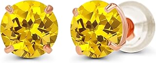 Un ensemble de boucles d'oreilles serties de pierres de naissance originales en or