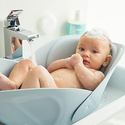 Baignoire frida baby soft, facile à nettoyer avec un oreiller de bain