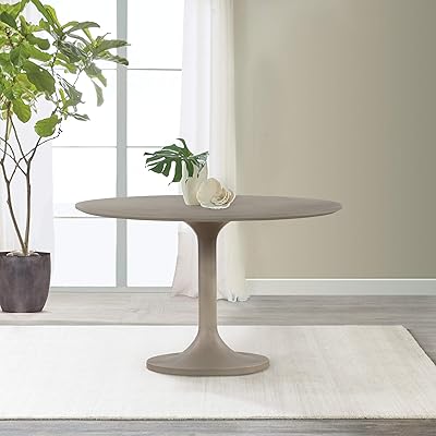 Table de salle à manger ronde tulipe en béton et métal armen living