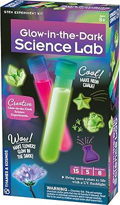 Kit d'expérimentation stem du laboratoire scientifique qui brille dans le noir