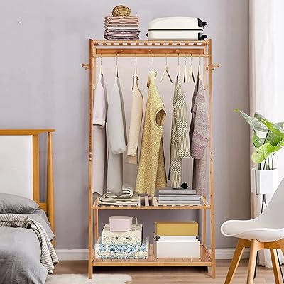 Portant à vêtements en bambou medela : porte-vêtements avec étagère à 2 niveaux, porte-vêtements sur pied, armoire ouverte avec crochets pour salon, chambre à coucher. Simplifiez vos achats avec Diaytar, le e-commerce nouvelle génération