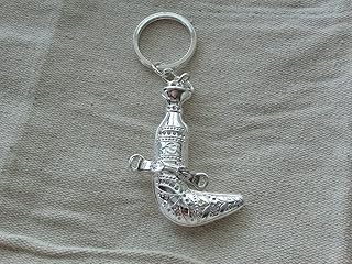 Porte-clés oman pour voiture ou maison, un porte-clés avec le logo du poignard
