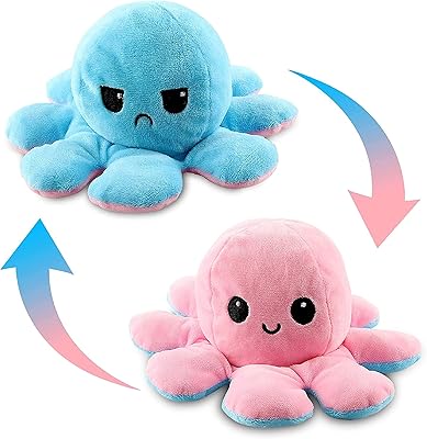 Une peluche en forme de pieuvre à deux visages avec des expressions