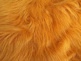 Tissu fausse fourrure longue marron miel 1 m 150 cm