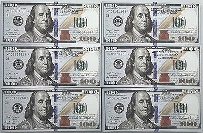 200 billets de 100 $ recto-verso entièrement imprimés et liste de billets sous forme de vrais billets, copie d'argent, qui semblent de vrais films, télévision, vidéos. Diaytar : L'e-commerce accessible à tous les Sénégalais